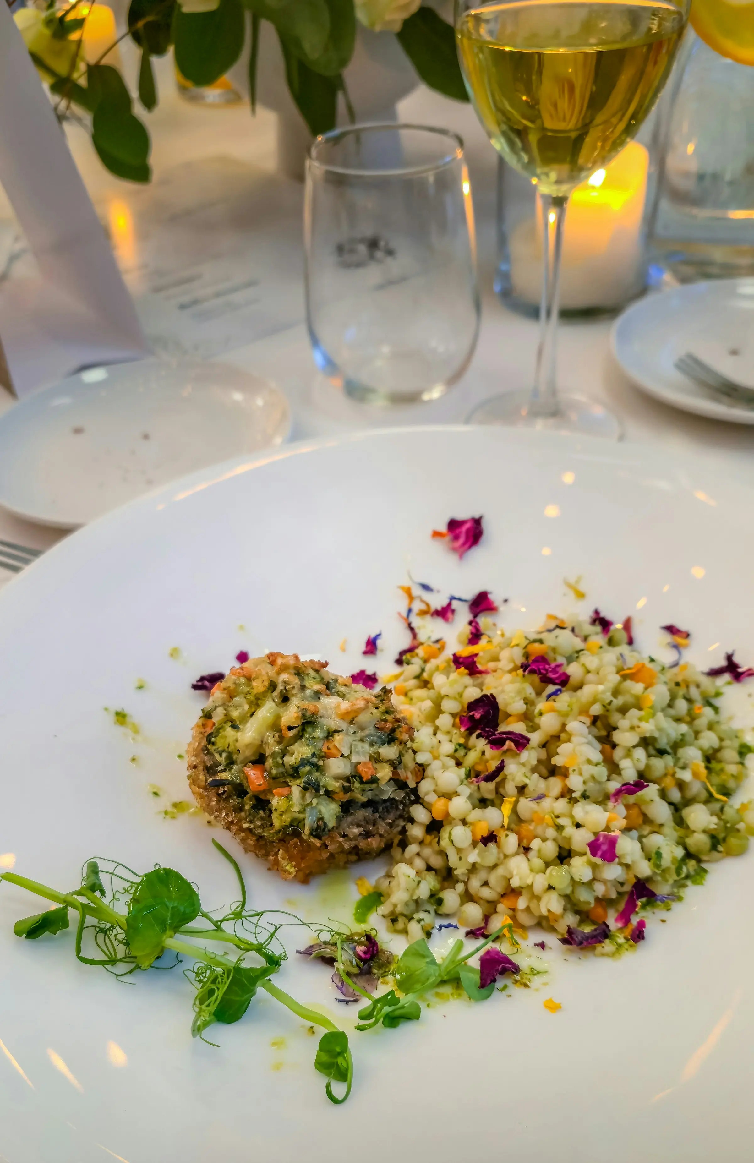 Stuffed mushroom with herbed couscous and flower petals